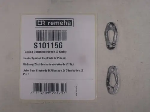 Zwei metallische Dichtungen von Remeha, auf einem Produktetikett mit Barcode und mehrsprachiger Beschreibung zur Verwendung in Zünd-Ionisationselektroden.